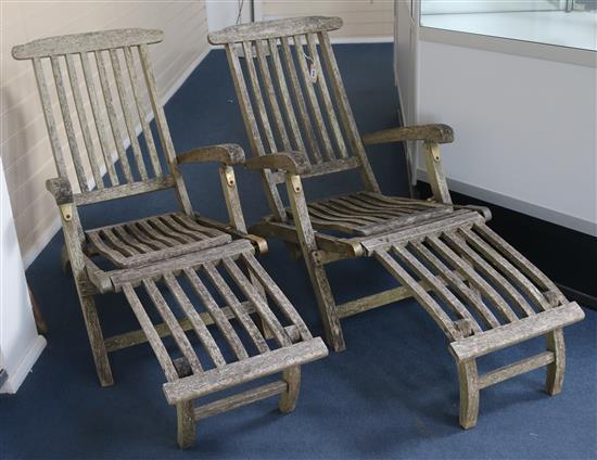 A pair of weathered steamer chairs